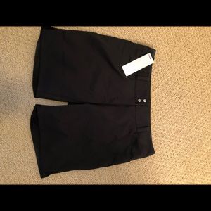 Women’s Adidas 7” black golf shorts new! Size 6